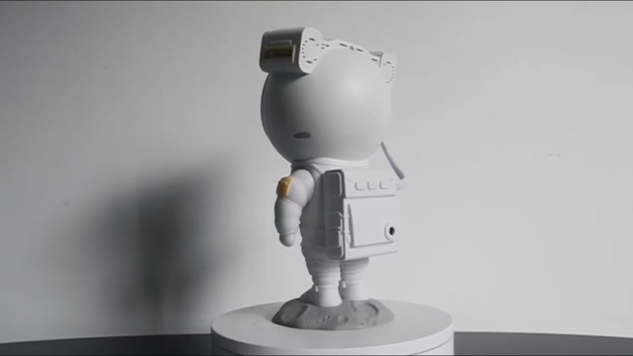Lampada Spaceman - Proiettore di luce notturna a sette colori con 8 effetti nebulosa, proiezione di stelle con telecomando per uso interno in camera da letto